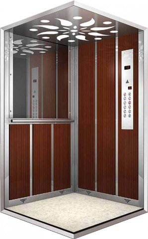 Cabine d’ascenseur habillée de panneaux bois